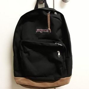 Jansport black and suede bottom backback